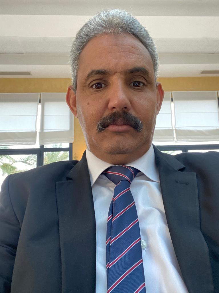 Mo